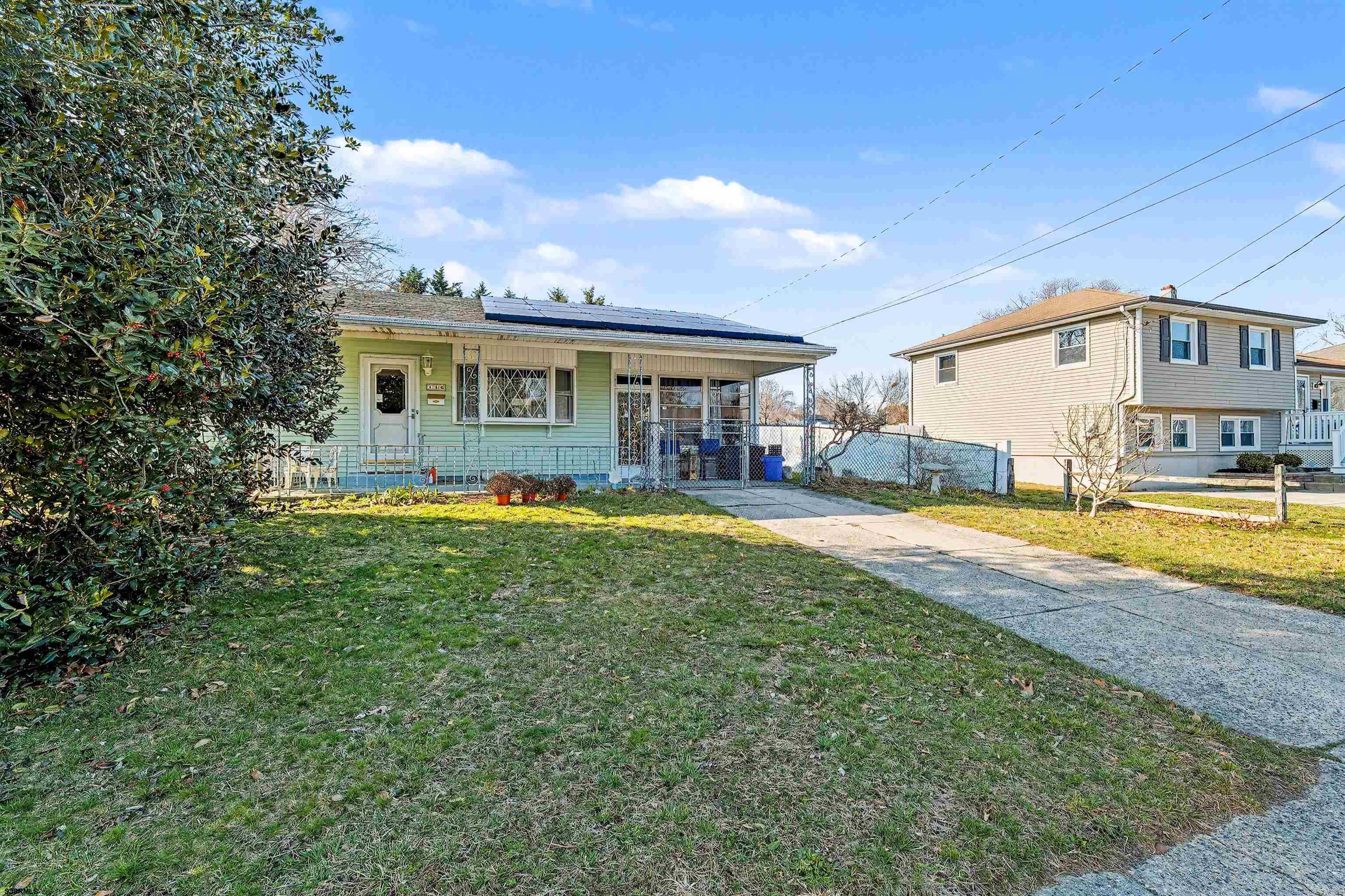 116 Haddon Road Somers Point, NJ 08244 - Photo 2 of 21 a view of a house with swimming pool and a yard
