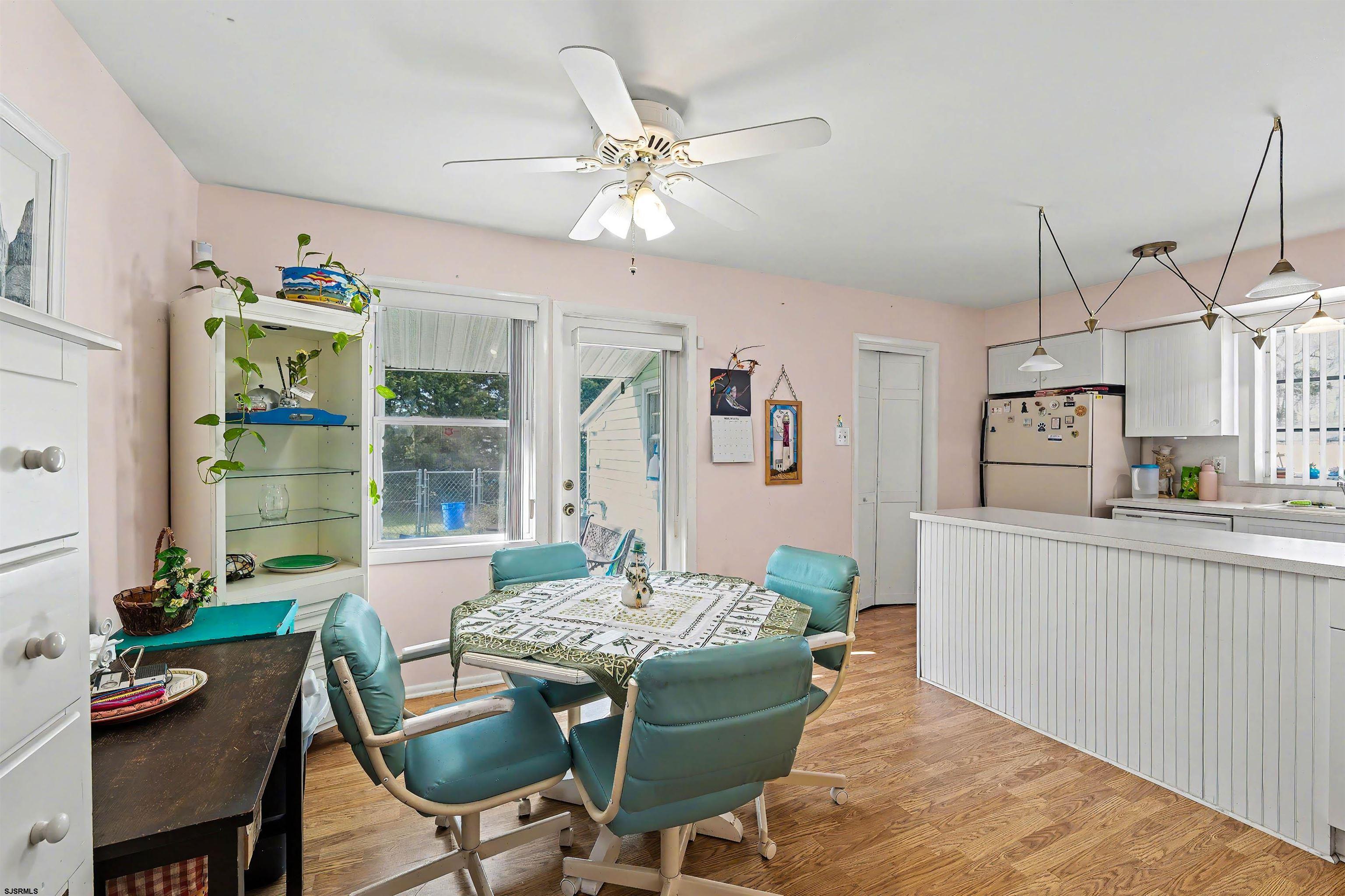 116 Haddon Road Somers Point, NJ 08244 - Photo 7 of 21 a view of a dining room with furniture window and outside view
