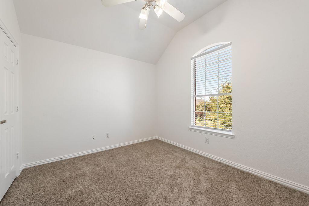 2640 Lake Ridge Drive Little Elm, TX 75068 - Photo 13 of 15 an empty room with a window