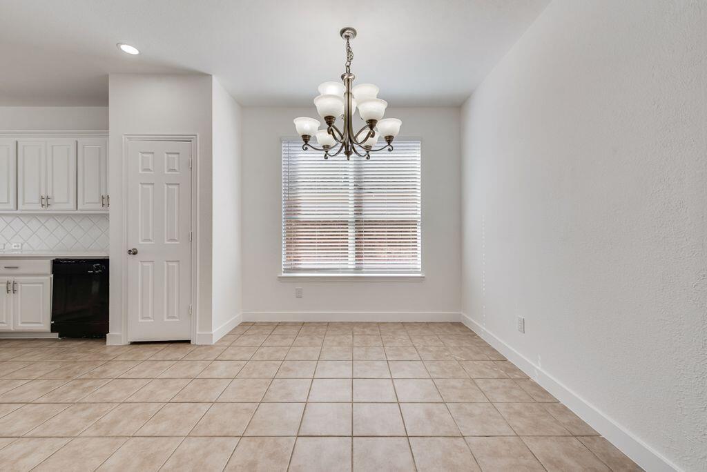 2640 Lake Ridge Drive Little Elm, TX 75068 - Photo 4 of 15 a view of an empty room with a window