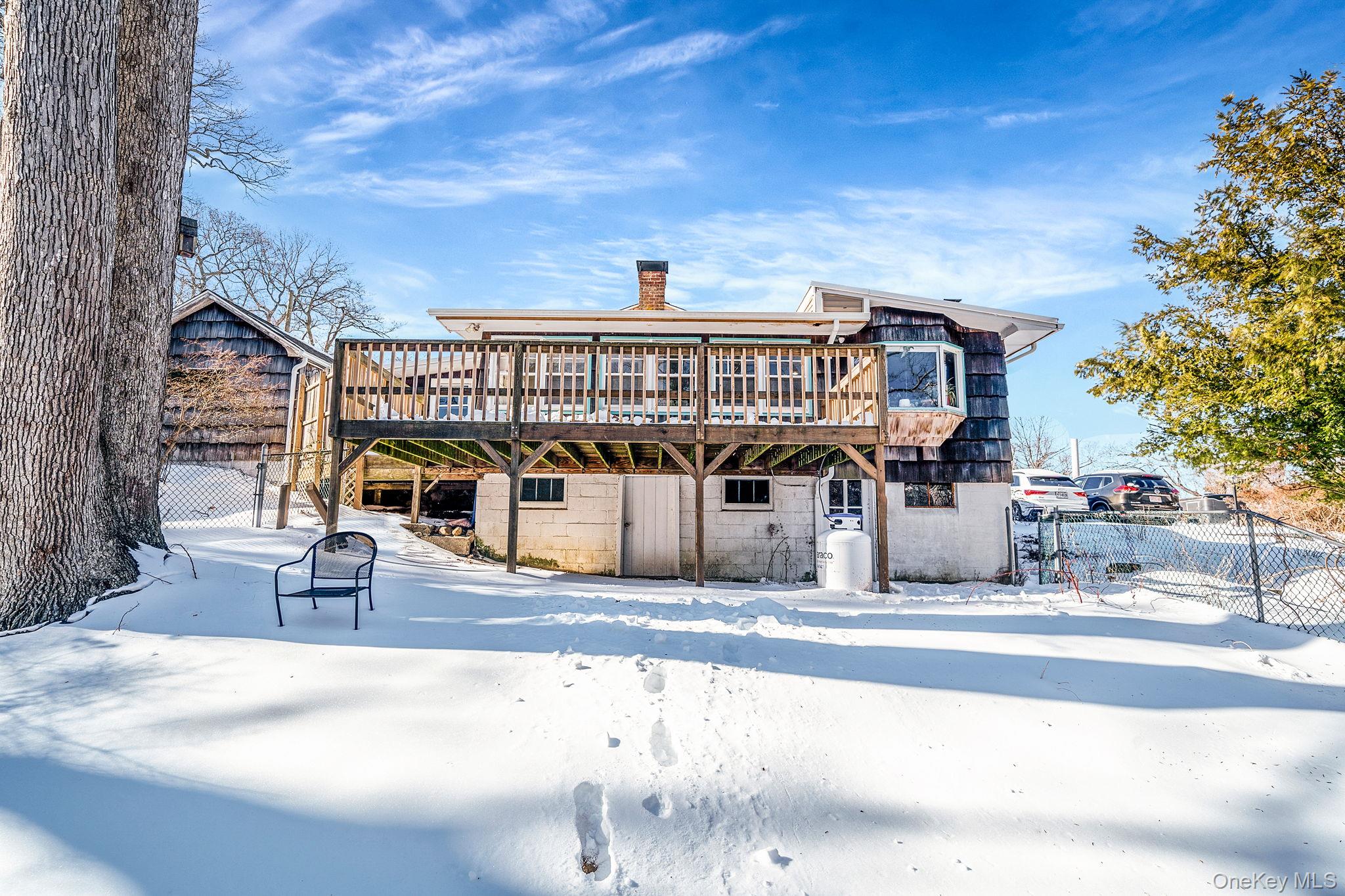 15 Ridge Lane Miller Place, NY 11764 - Photo 16 of 26 a view of a building with street view