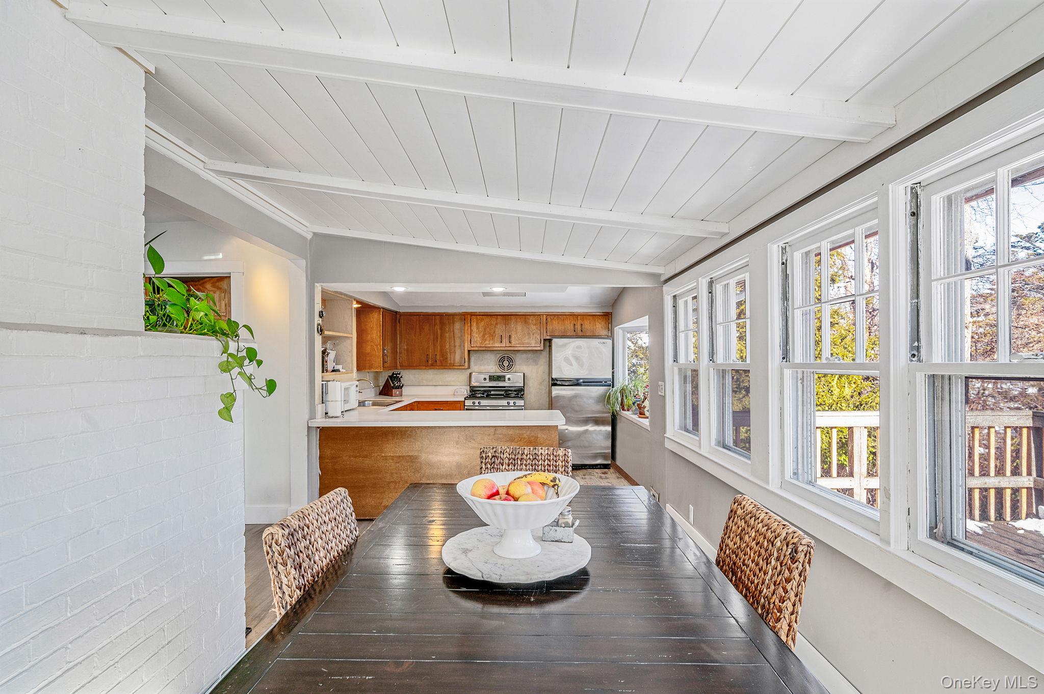 15 Ridge Lane Miller Place, NY 11764 - Photo 8 of 26 a living room with furniture and a large window