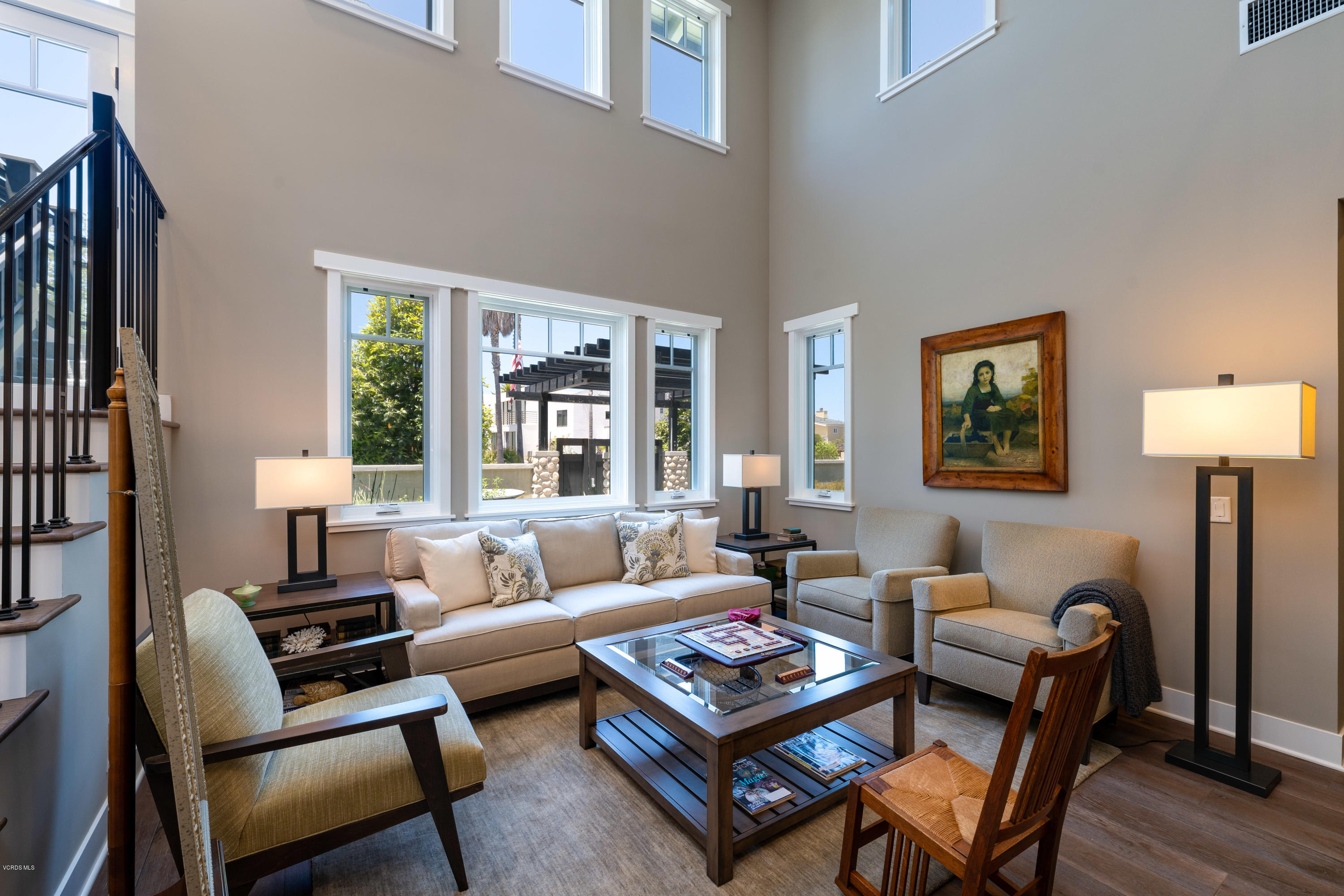 1520 Mandalay Beach Road Oxnard, CA 93035 - Photo 19 of 43 a living room with furniture a lamp next to a window and a lamp