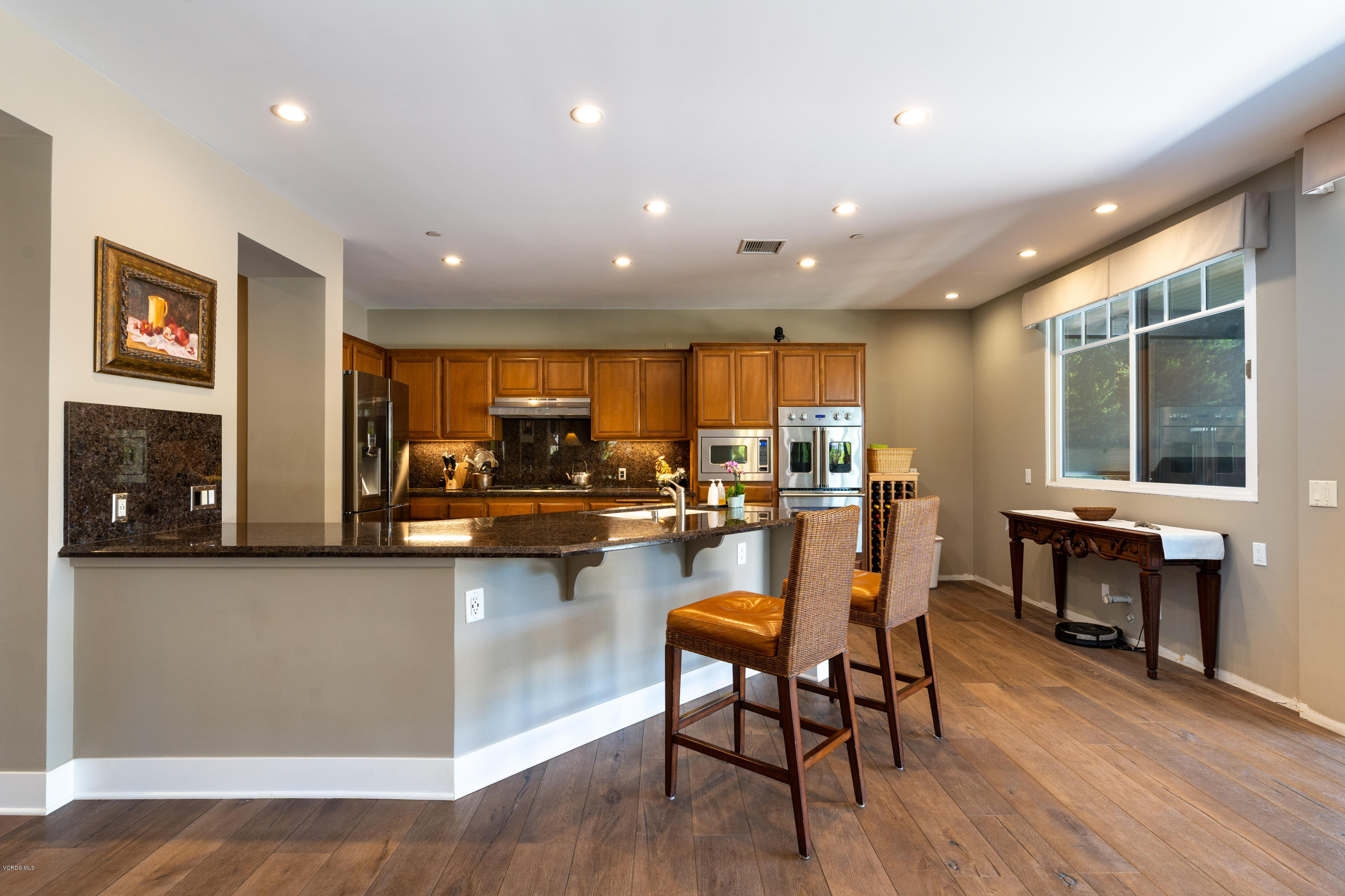 1520 Mandalay Beach Road Oxnard, CA 93035 - Photo 20 of 43 a kitchen with a table and chairs in it