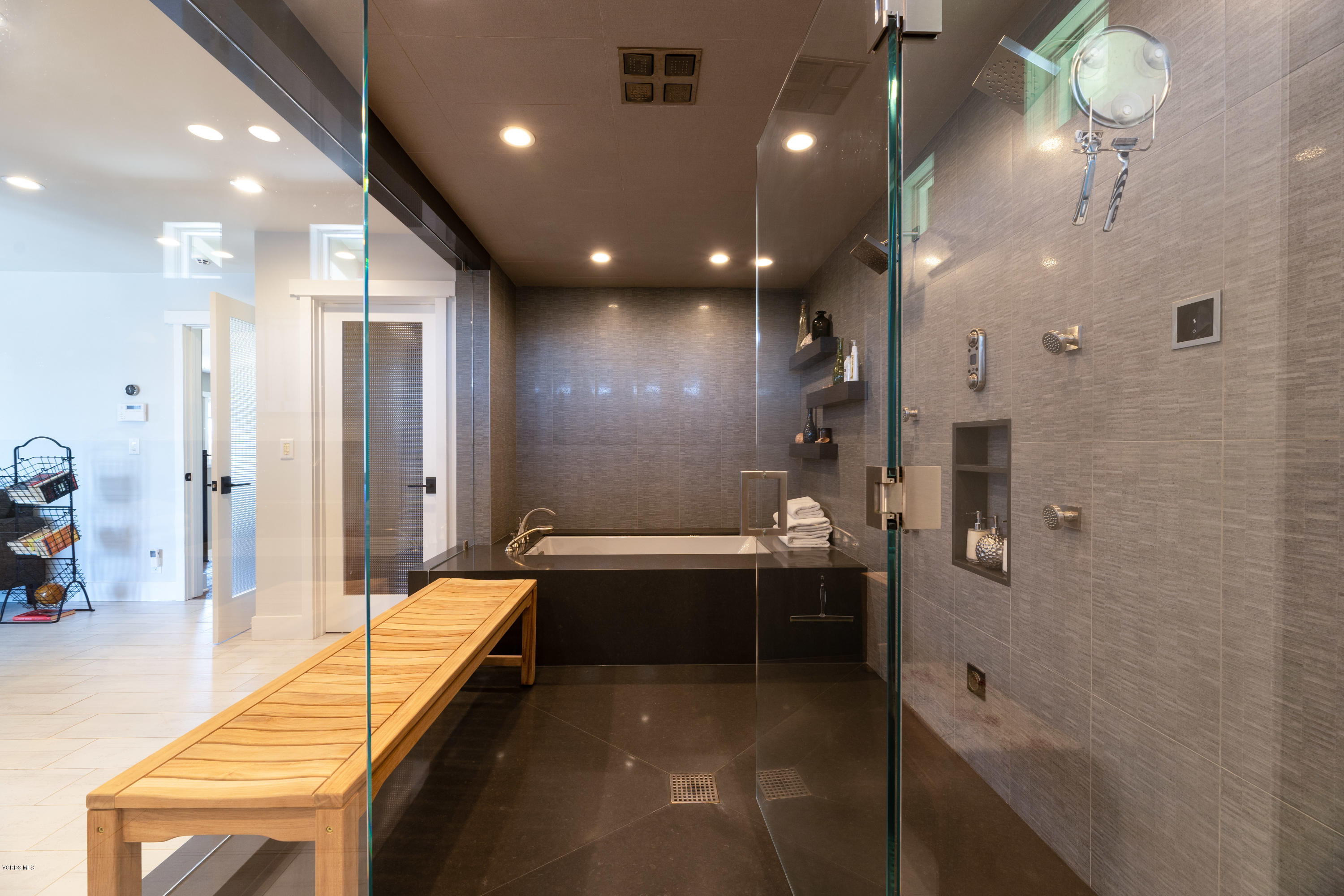 1520 Mandalay Beach Road Oxnard, CA 93035 - Photo 32 of 43 a bathroom with a tub a sink and mirror