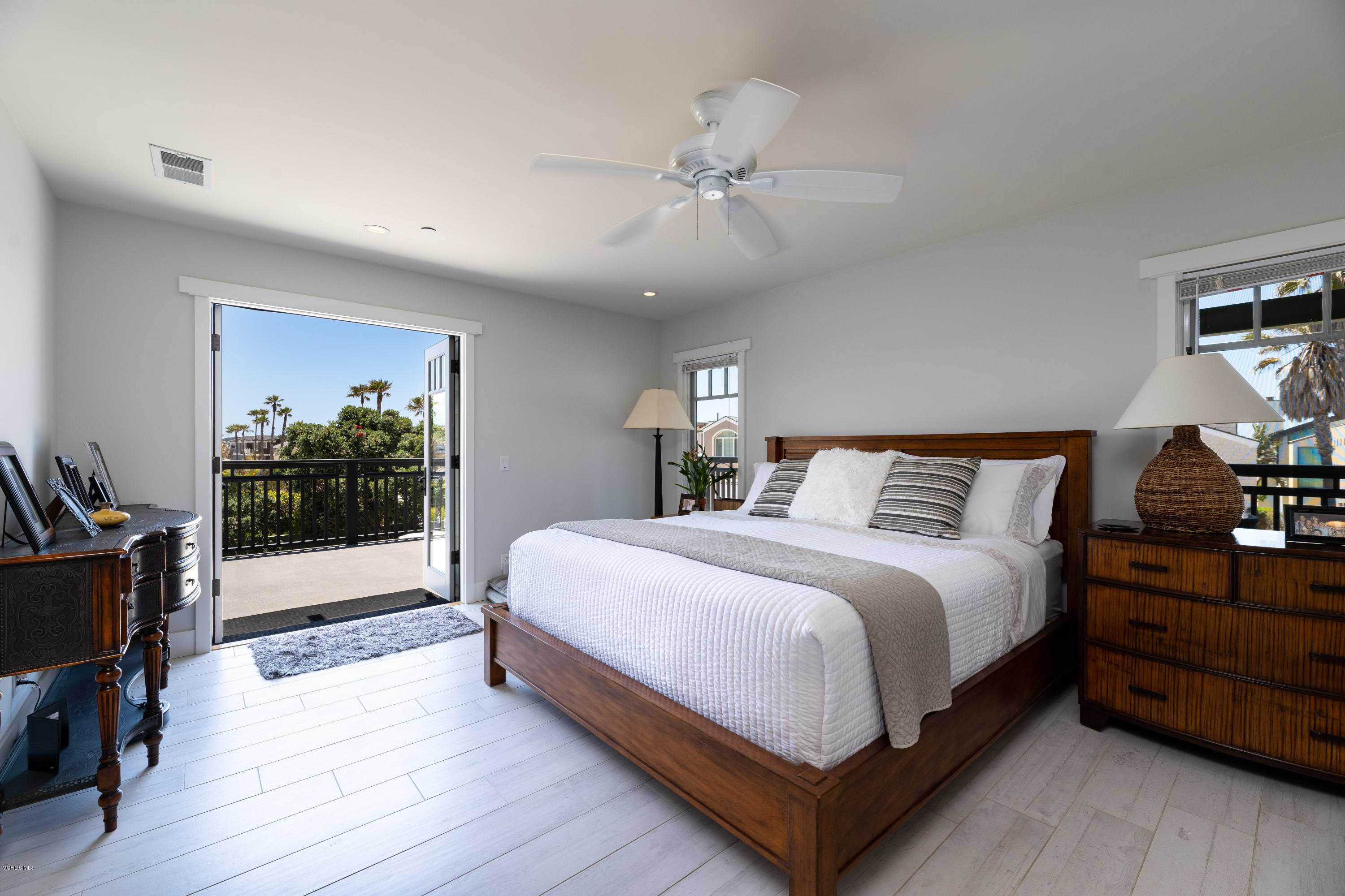 1520 Mandalay Beach Road Oxnard, CA 93035 - Photo 33 of 43 a bedroom with a bed and a flat tv screen on dresser