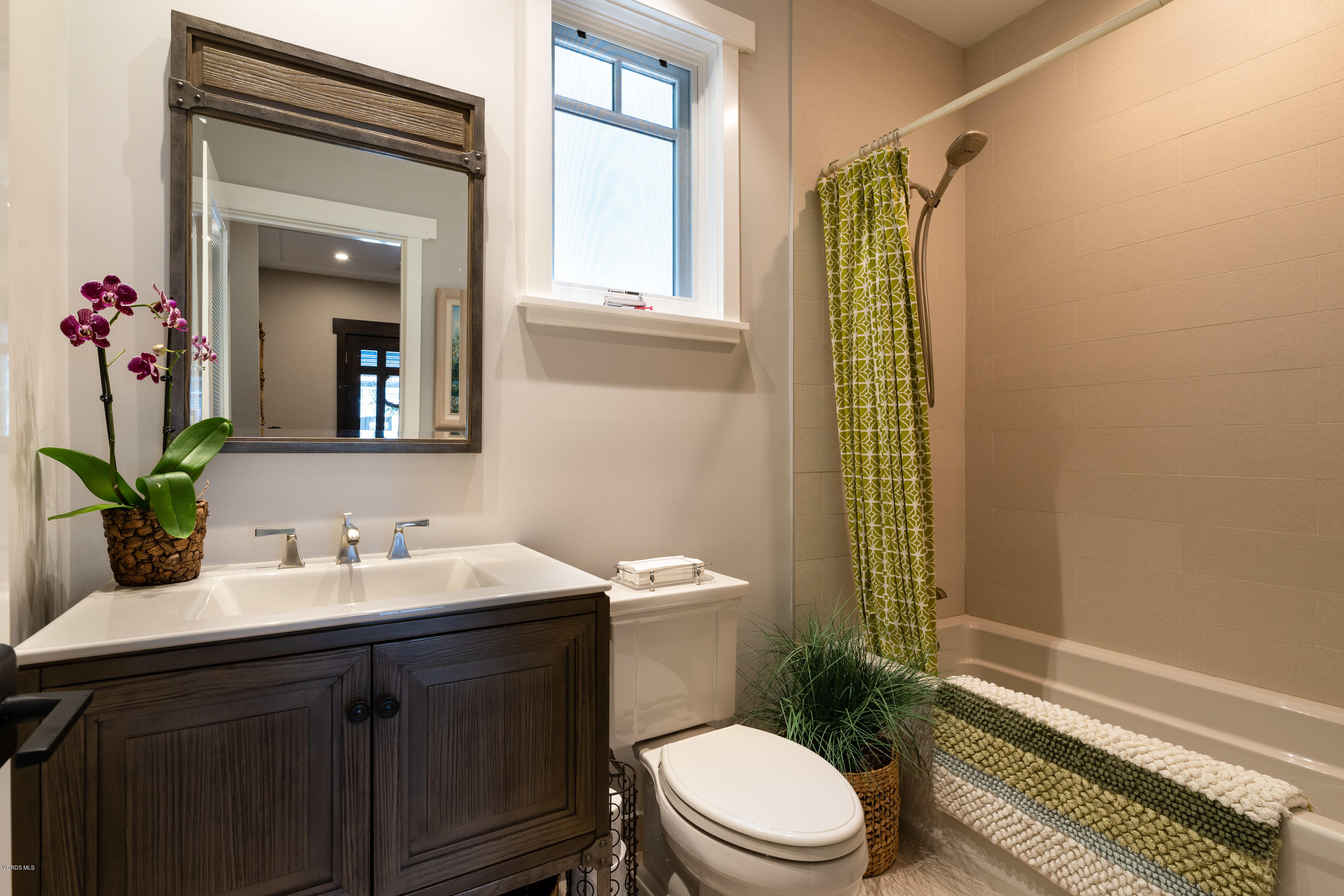 1520 Mandalay Beach Road Oxnard, CA 93035 - Photo 40 of 43 a bathroom with a sink a toilet and shower