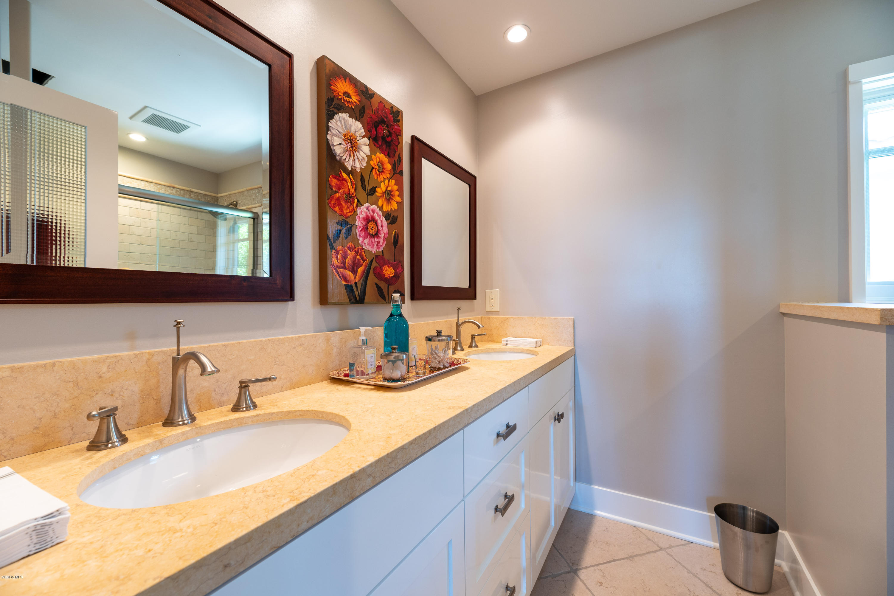 1520 Mandalay Beach Road Oxnard, CA 93035 - Photo 41 of 43 a bathroom with a granite countertop sink and a mirror