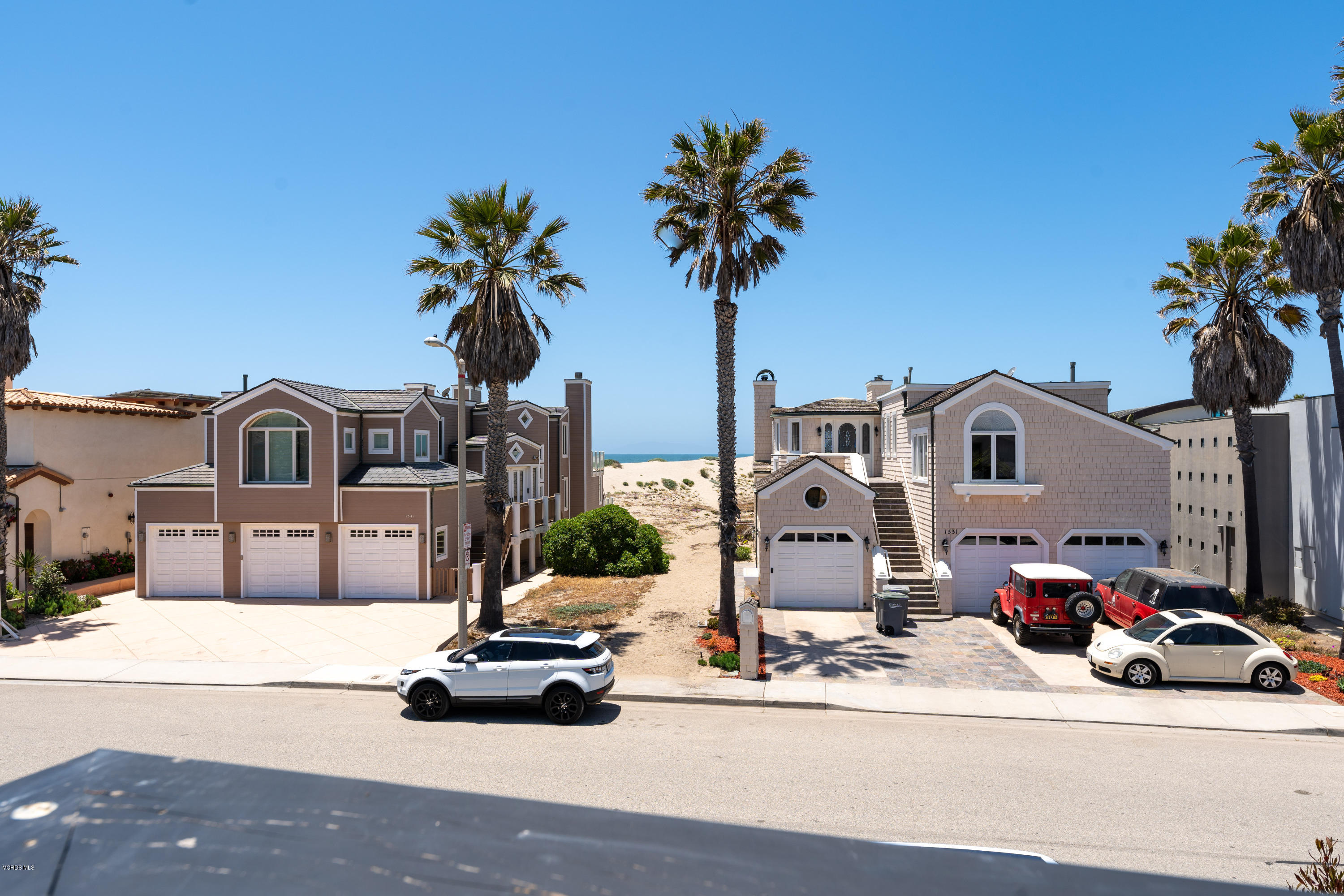 1520 Mandalay Beach Road Oxnard, CA 93035 - Photo 42 of 43 a car parked in front of a house
