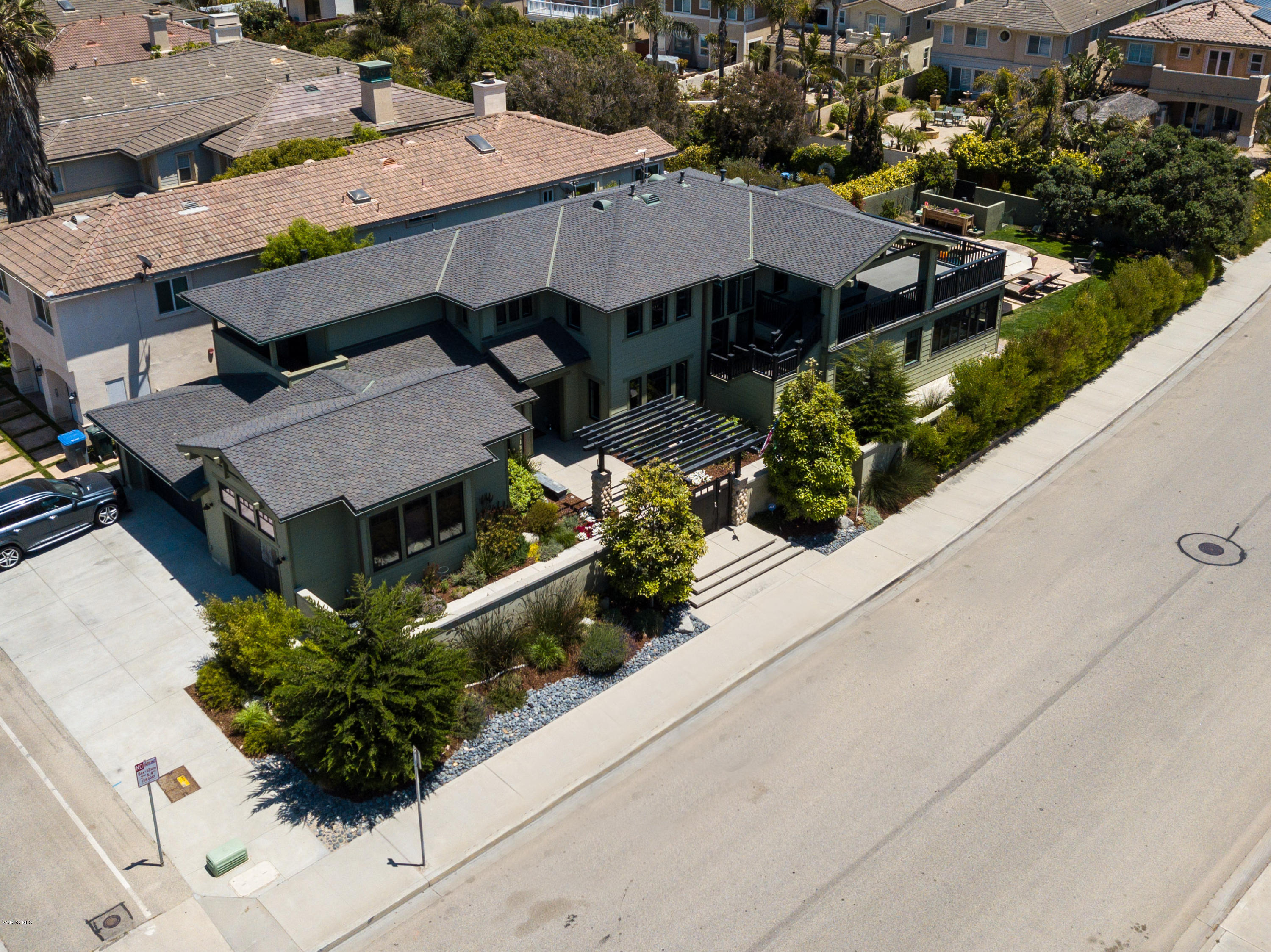 1520 Mandalay Beach Road Oxnard, CA 93035 - Photo 7 of 43 an aerial view of a house with a yard and potted plants