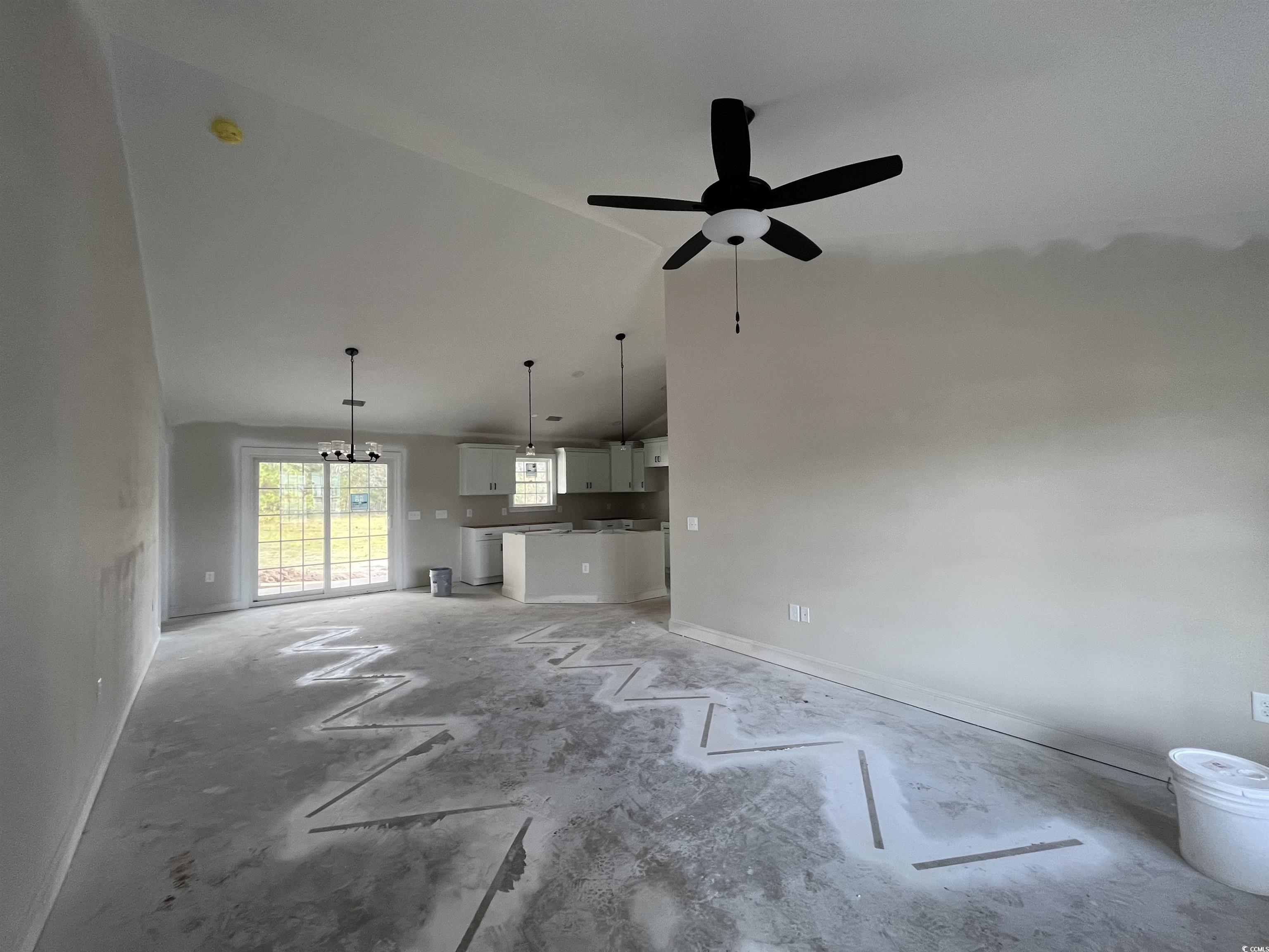 3261 Red Bluff Road Loris, SC 29569 - Photo 2 of 39 Unfurnished living room with high vaulted ceiling and ceiling fan