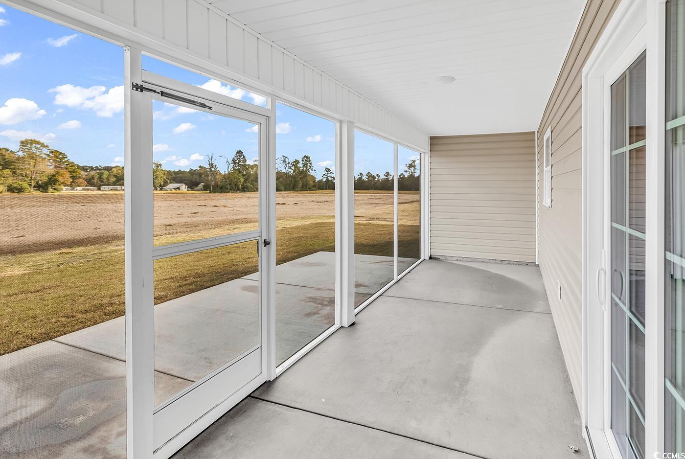 3261 Red Bluff Road Loris, SC 29569 - Photo 35 of 39 View of unfurnished sunroom