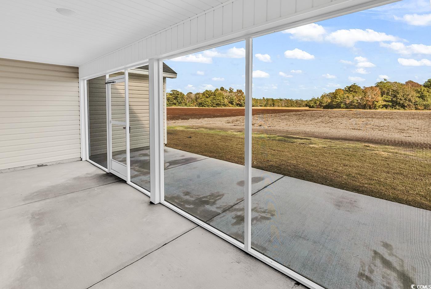 3261 Red Bluff Road Loris, SC 29569 - Photo 37 of 39 View of unfurnished sunroom