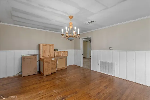 a view of a livingroom with a kitchen