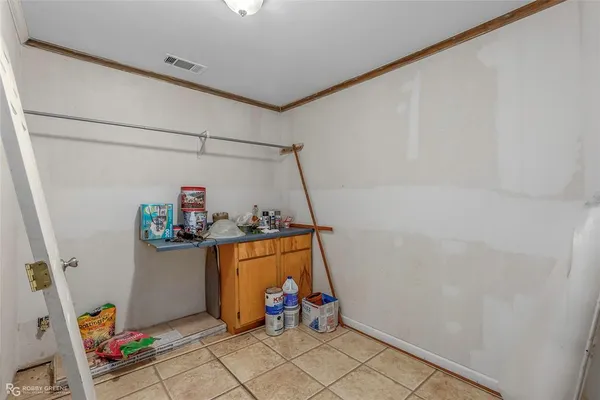 a room with storage and utility