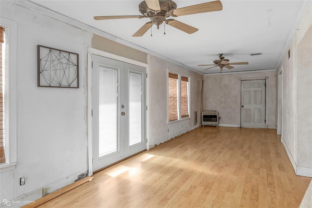 411 Camp Bistno Road Doyline, LA 71023 - Photo 26 of 32 a view of an empty room with a window