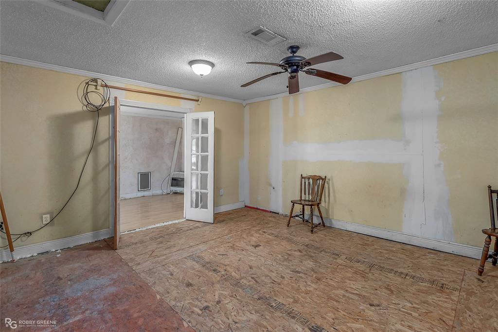 411 Camp Bistno Road Doyline, LA 71023 - Photo 30 of 32 a view of empty room with ceiling fan