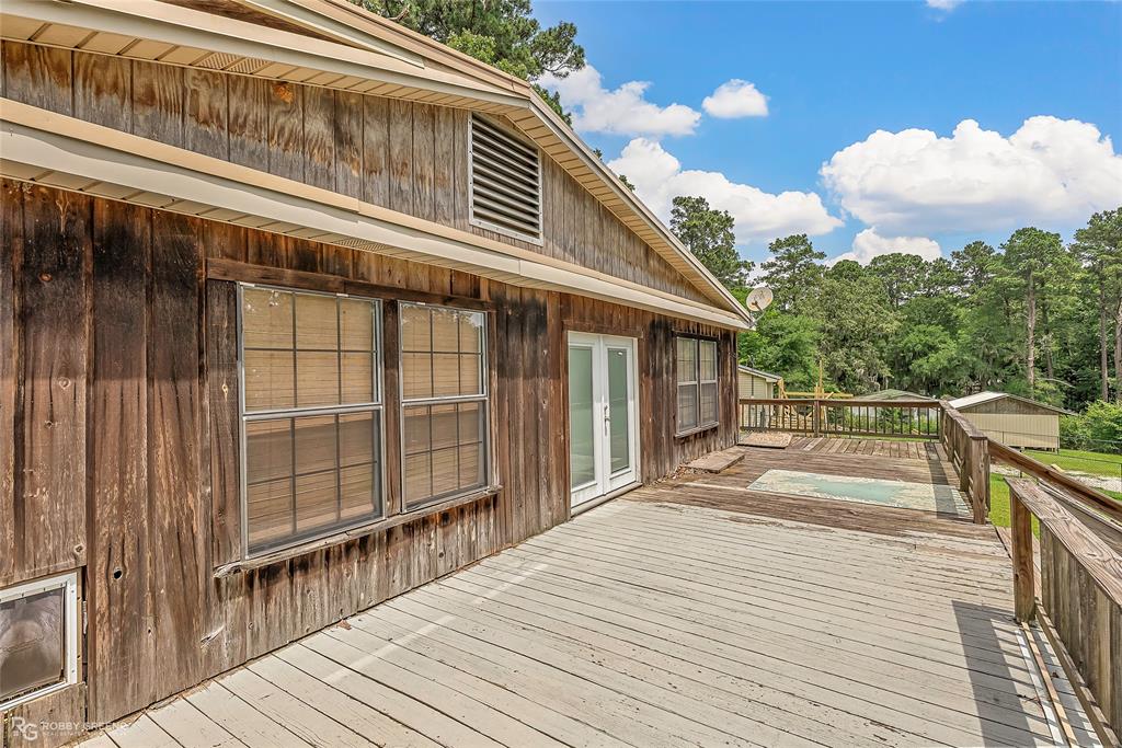 411 Camp Bistno Road Doyline, LA 71023 - Photo 7 of 32 a view of a house with a balcony
