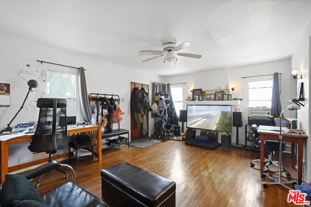 a kitchen with cabinets appliances and a sink