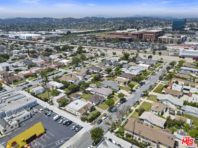 an aerial view of a city with lots of residential buildings