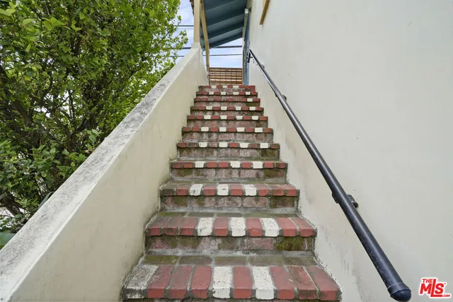 a view of hallway with washer and dryer