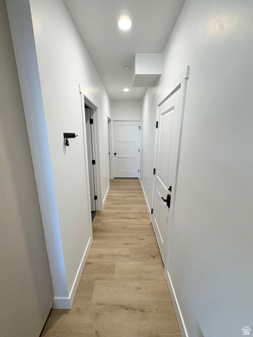70 East Hwy 153, Unit A4 Beaver, UT 84713 - Photo 11 of 19 Hall featuring baseboards and light wood-style flooring