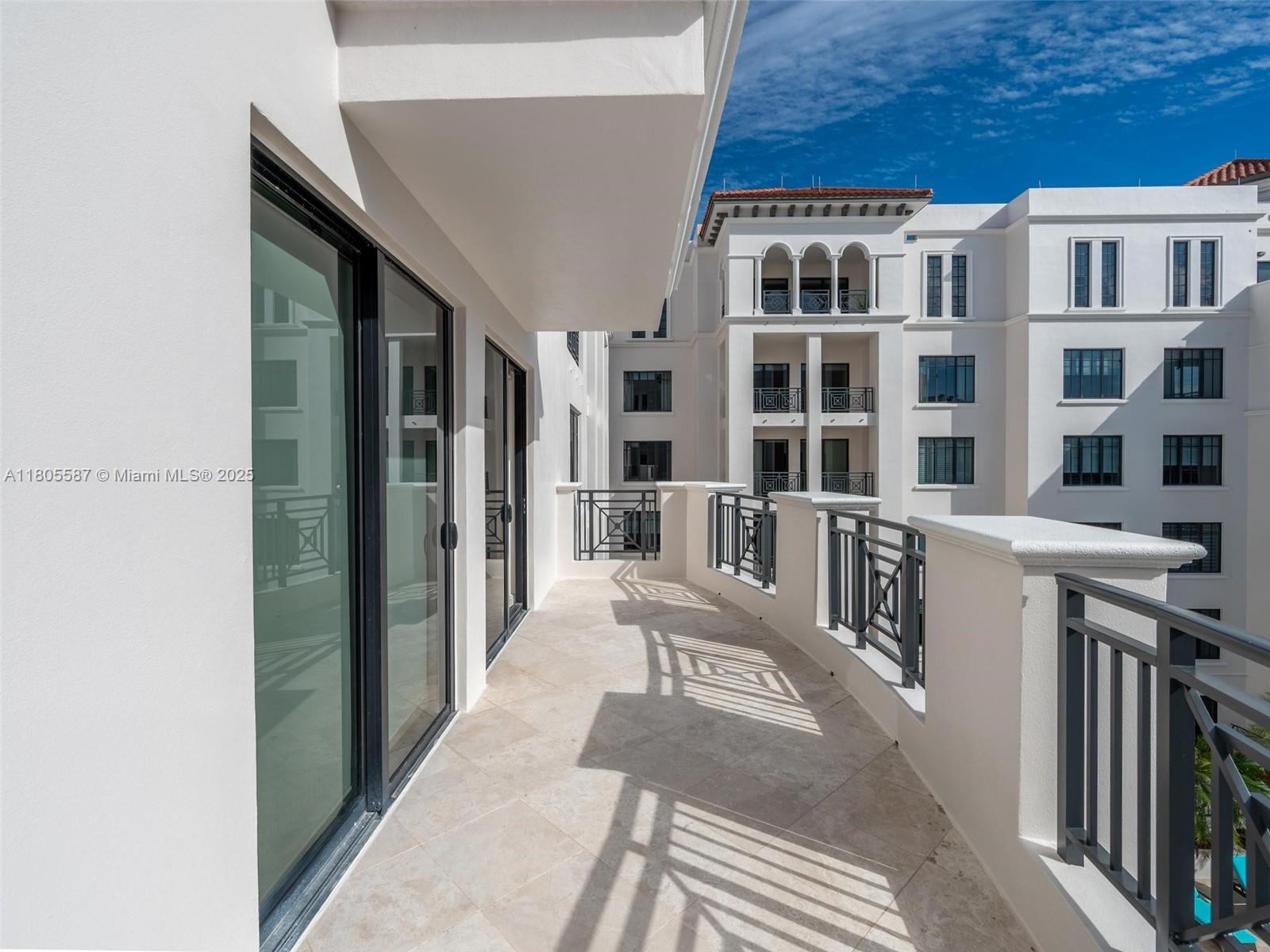 200 East Palmetto Park Road, Unit 700 Boca Raton, FL 33432 - Photo 13 of 36 a view of a building from a hallway