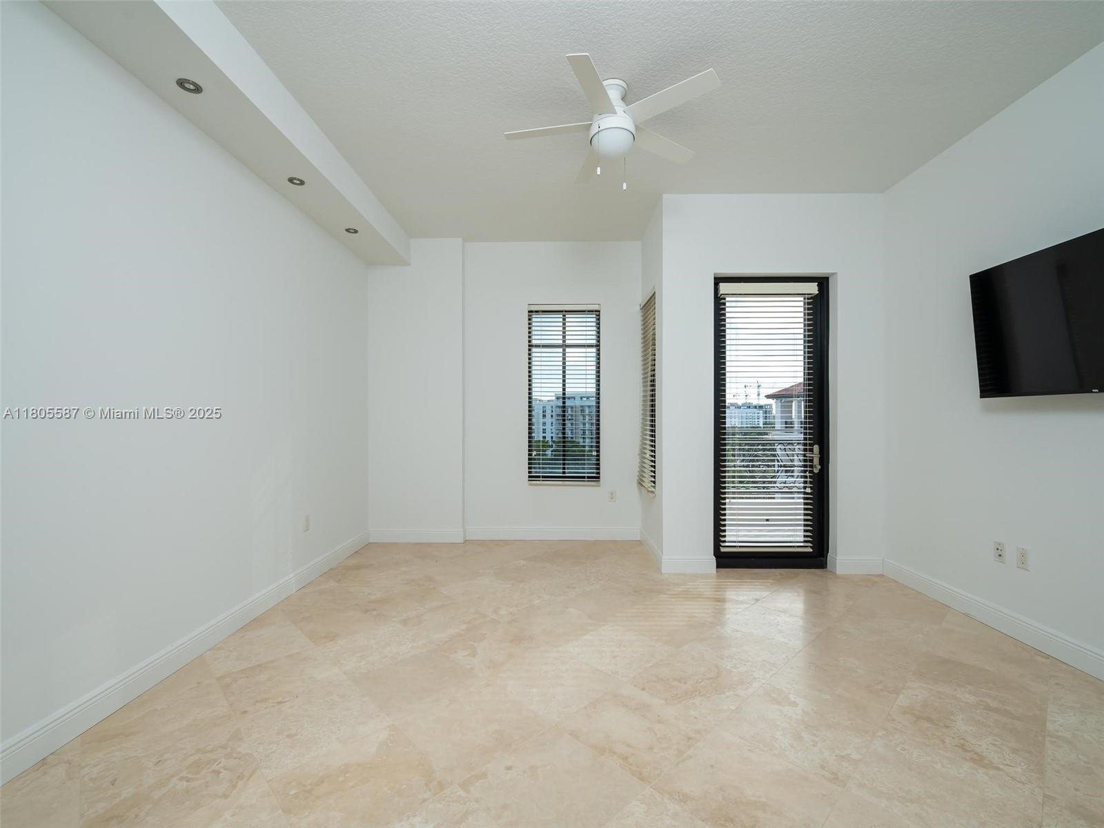 200 East Palmetto Park Road, Unit 700 Boca Raton, FL 33432 - Photo 24 of 36 a view of an empty room with a window