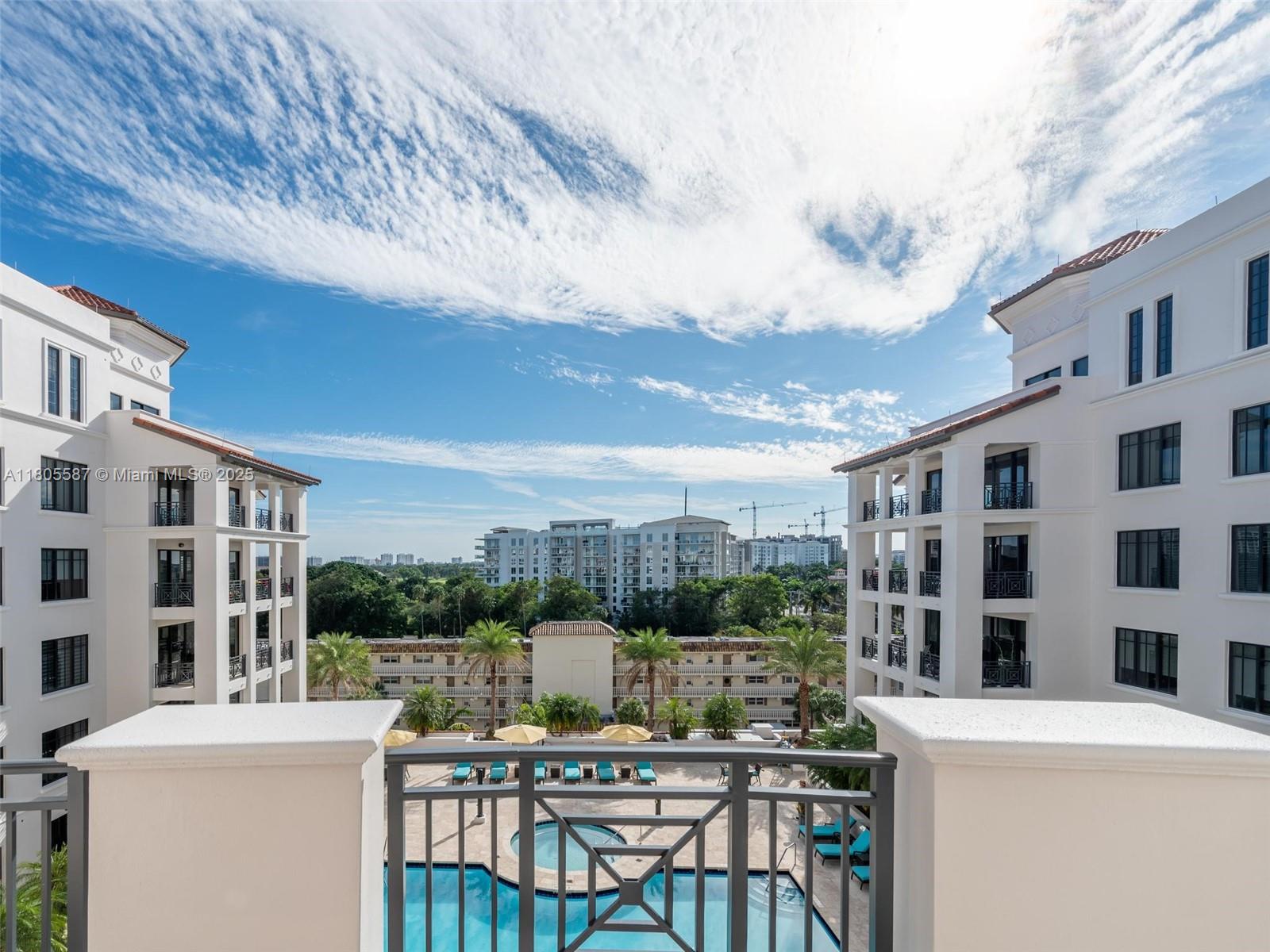 200 East Palmetto Park Road, Unit 700 Boca Raton, FL 33432 - Photo 29 of 36 a view of a chairs and table in a terrace