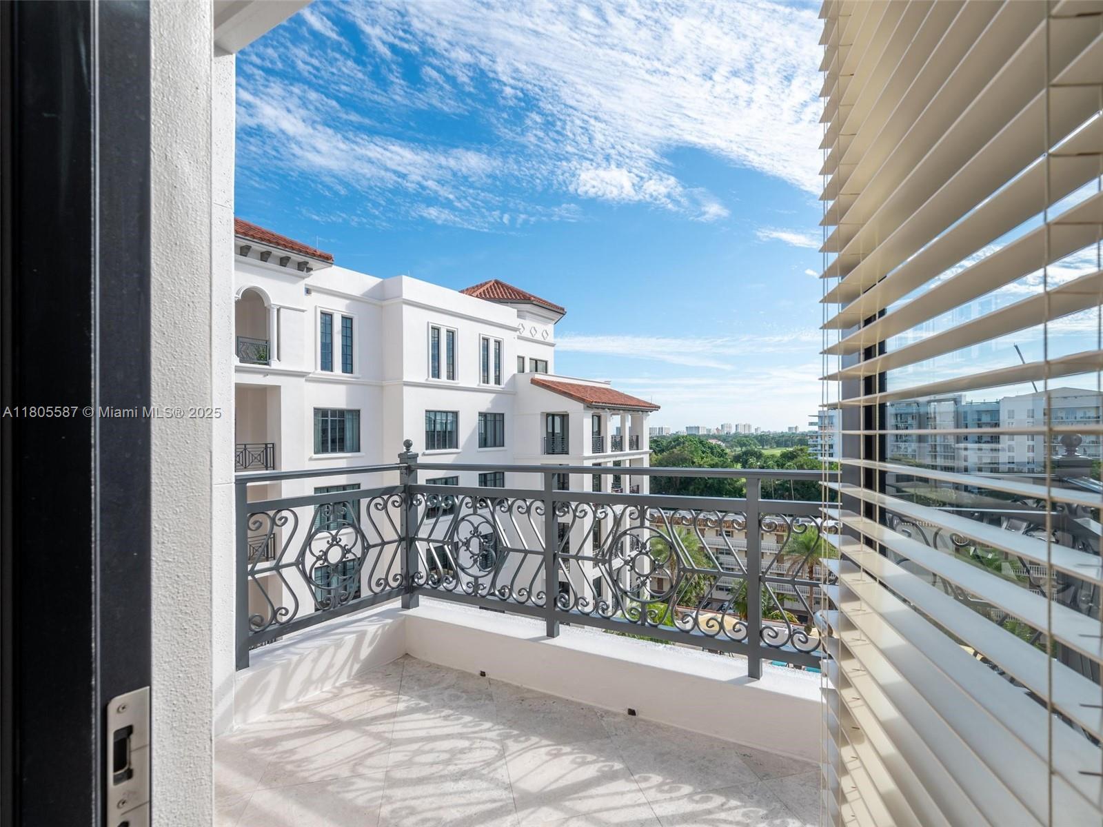 200 East Palmetto Park Road, Unit 700 Boca Raton, FL 33432 - Photo 31 of 36 a view of a balcony with residential houses