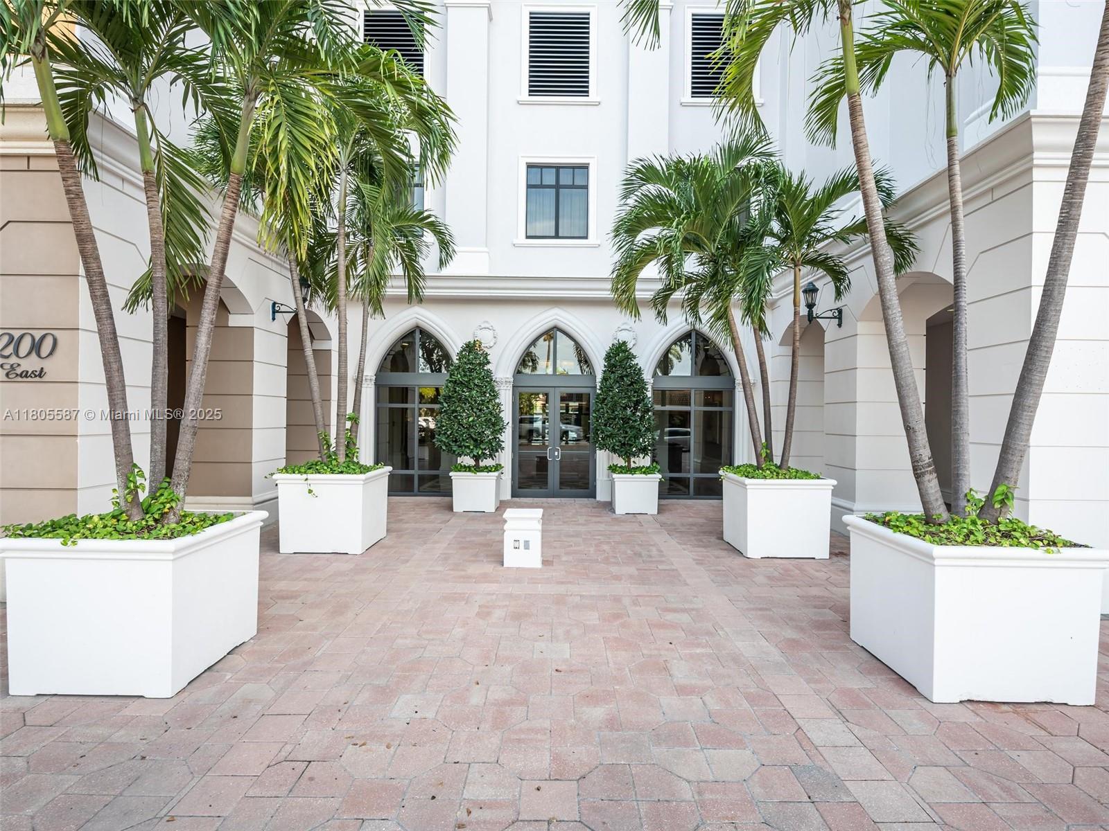 200 East Palmetto Park Road, Unit 700 Boca Raton, FL 33432 - Photo 35 of 36 a view of a house with palm trees