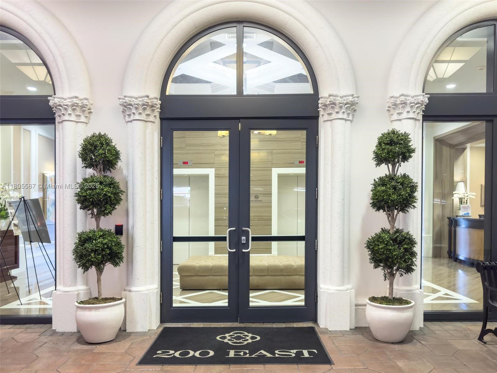 200 East Palmetto Park Road, Unit 700 Boca Raton, FL 33432 - Photo 36 of 36 a view of a room with windows and potted plant