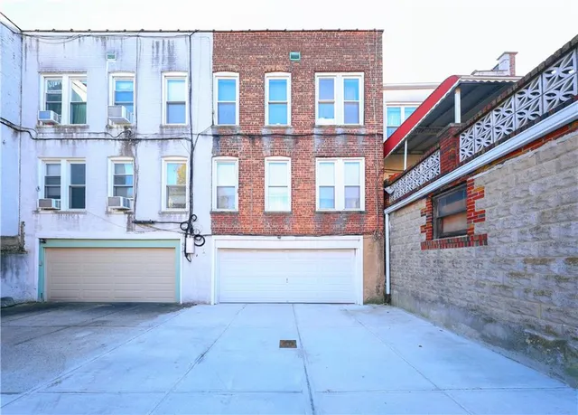 a view of a street with buildings