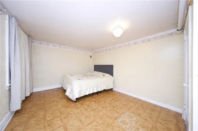 a bathroom with a sink a toilet and shower curtain