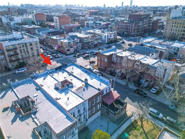 a front view of small building with an entrance