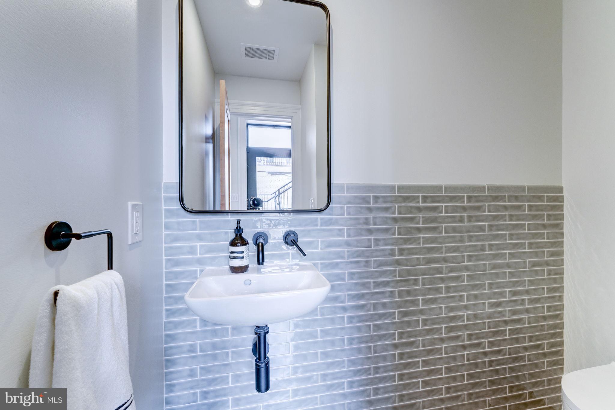 1327 R Street Northwest, Unit 2 Washington, DC 20009 - Photo 26 of 44 Powder room - upper level