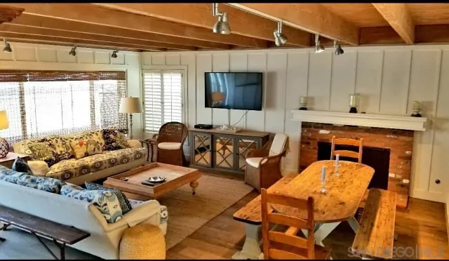 a outdoor space with wooden furniture