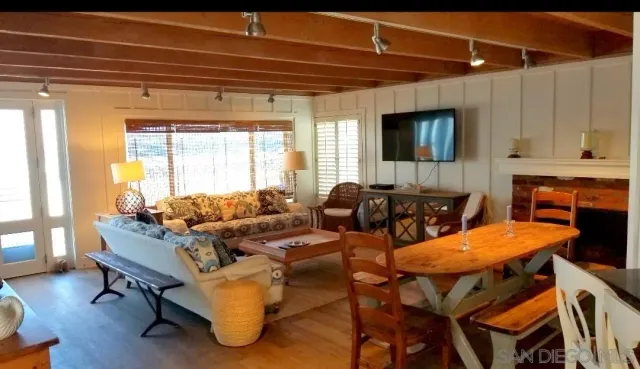 a patio with table and chairs