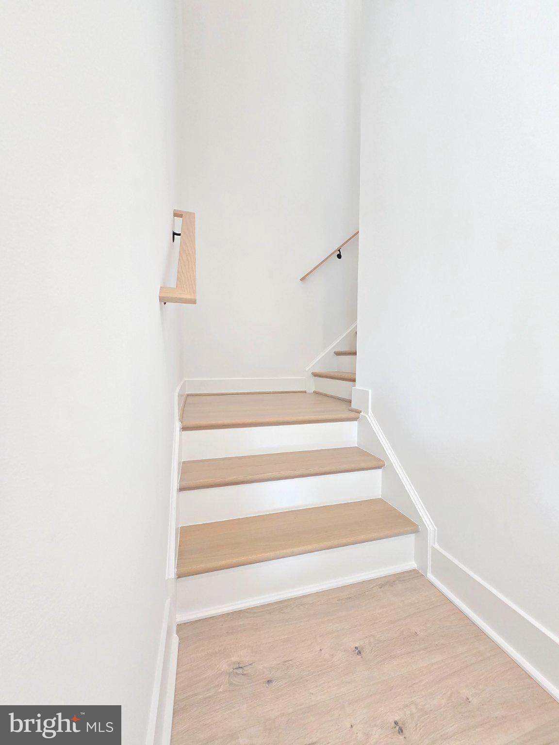2106 Tysons Ridgeline Road Falls Church, VA 22043 - Photo 18 of 28 Bright and inviting staircase ascent.