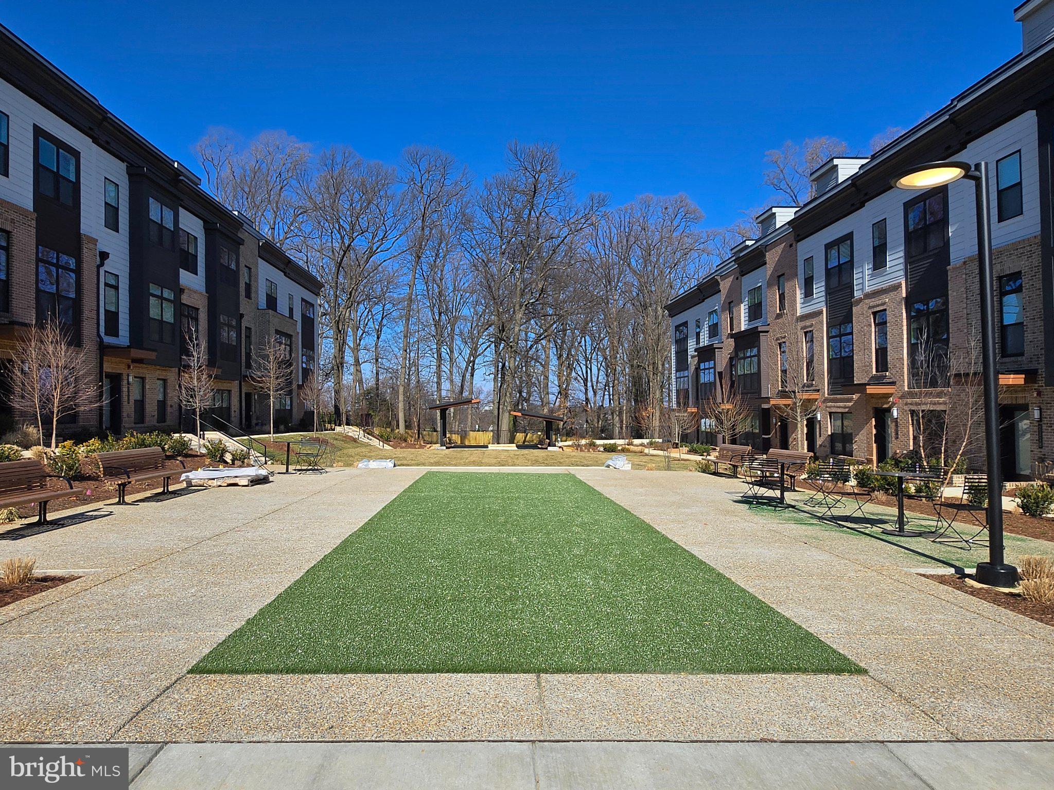 2106 Tysons Ridgeline Road Falls Church, VA 22043 - Photo 23 of 28 Serene courtyard with lush greenery.