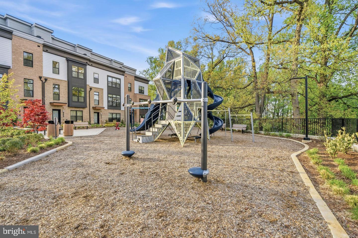 2106 Tysons Ridgeline Road Falls Church, VA 22043 - Photo 26 of 28 Modern playground amidst lush greenery.