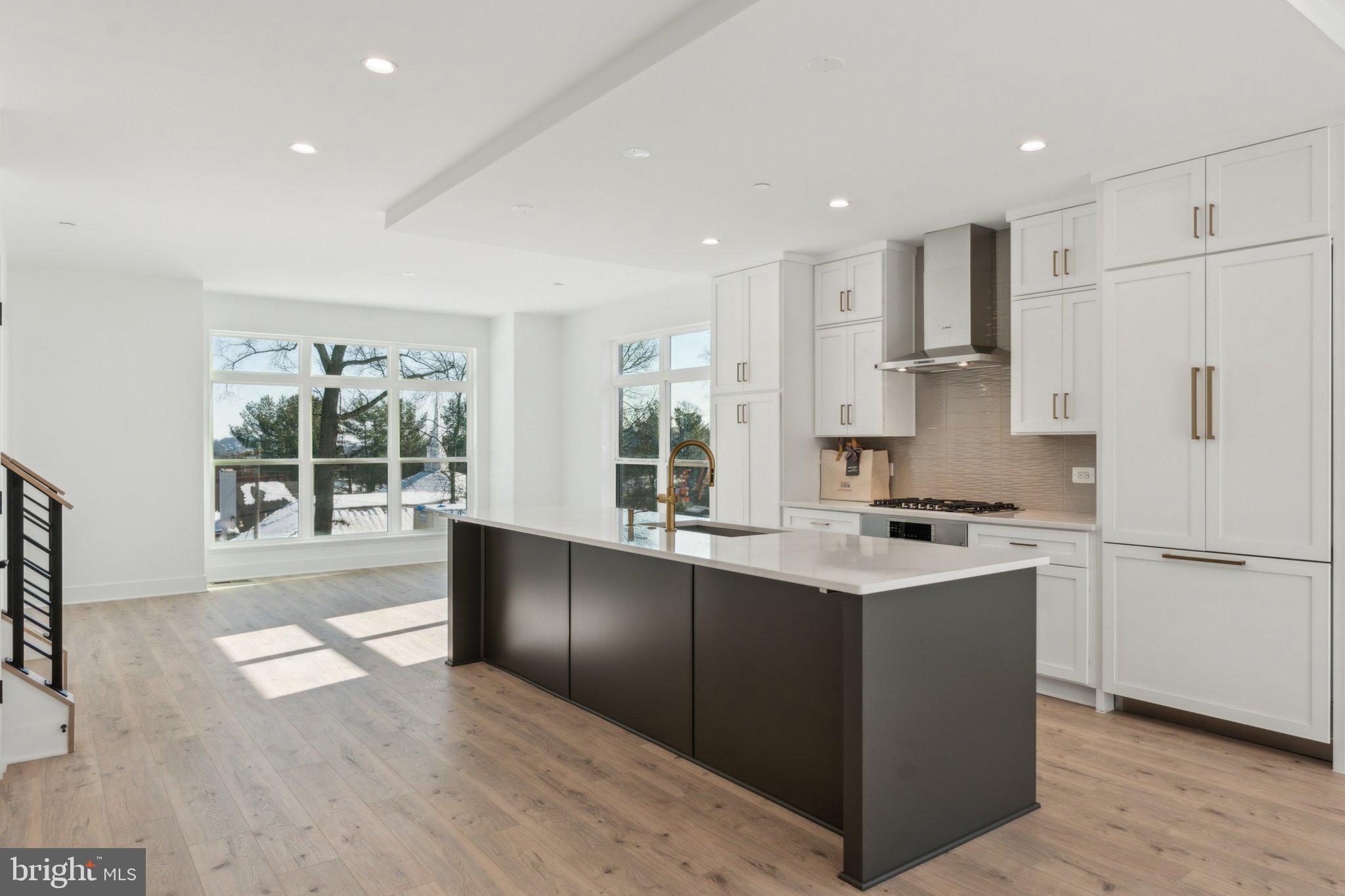 2106 Tysons Ridgeline Road Falls Church, VA 22043 - Photo 7 of 28 Modern kitchen with abundant light.