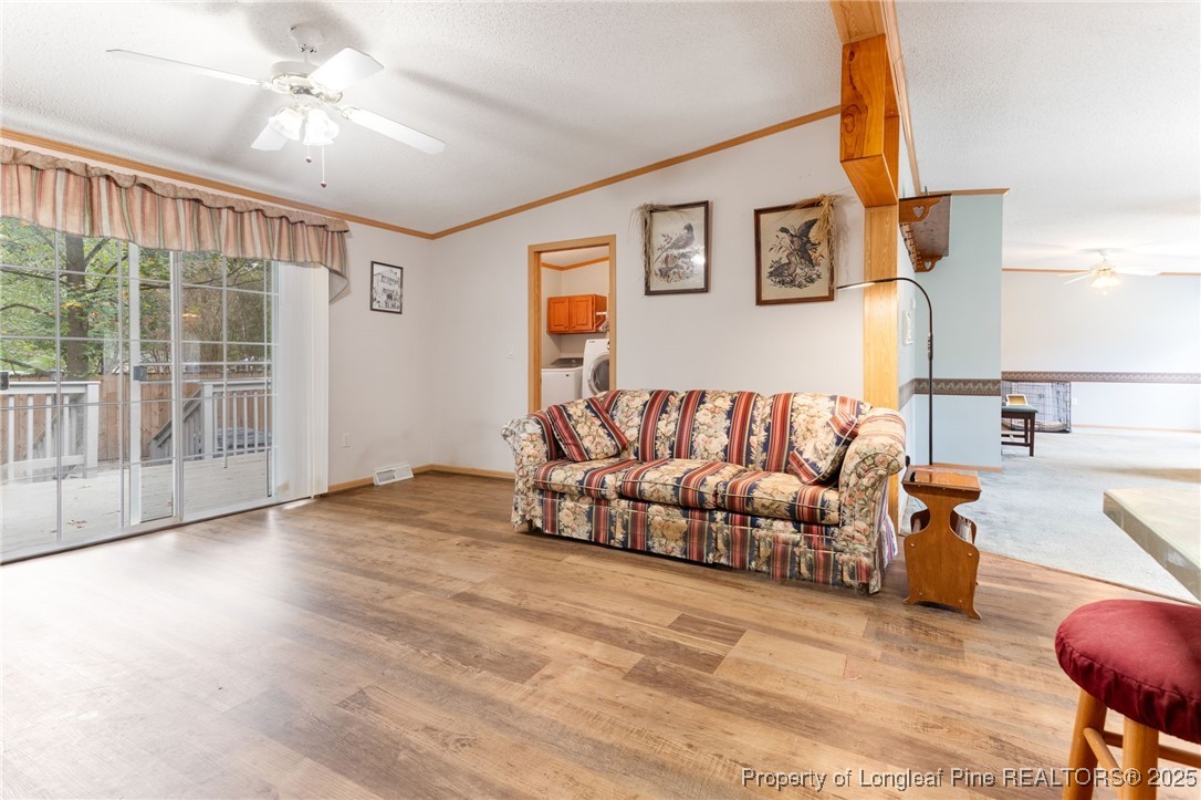 520 Inverary Drive Raeford, NC 28376 - Photo 13 of 43 a living room with furniture and a large window