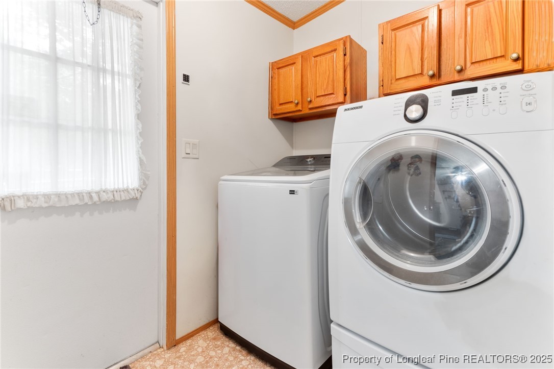 520 Inverary Drive Raeford, NC 28376 - Photo 29 of 43 a utility room with dryer and washer