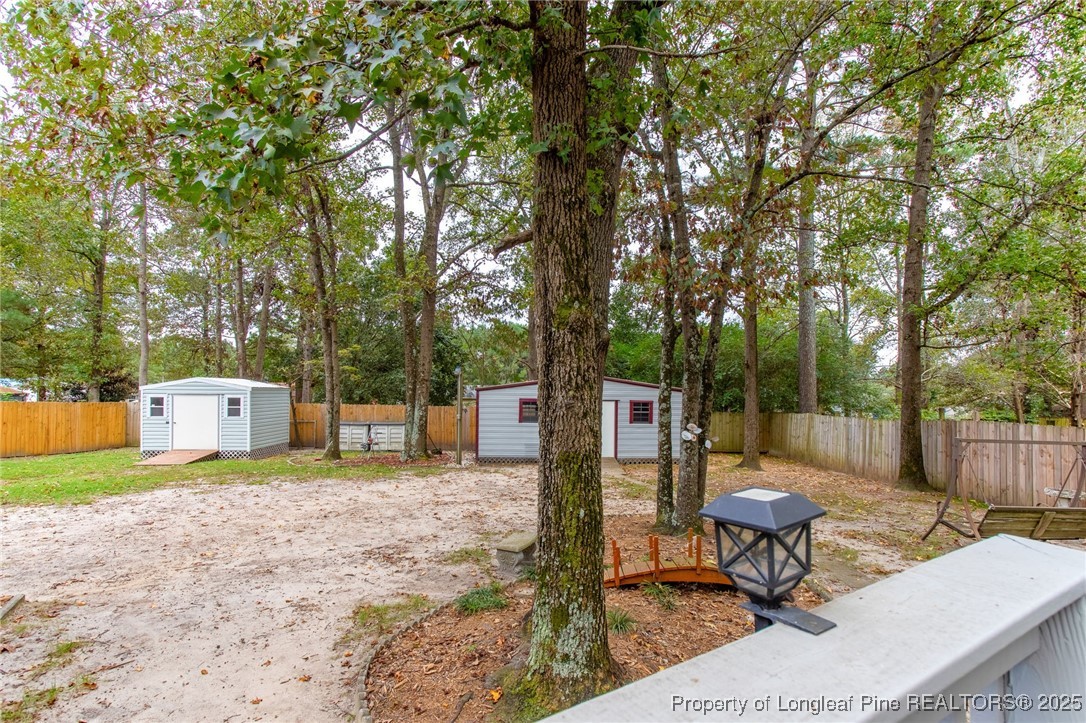 520 Inverary Drive Raeford, NC 28376 - Photo 32 of 43 a view of a backyard with sitting area