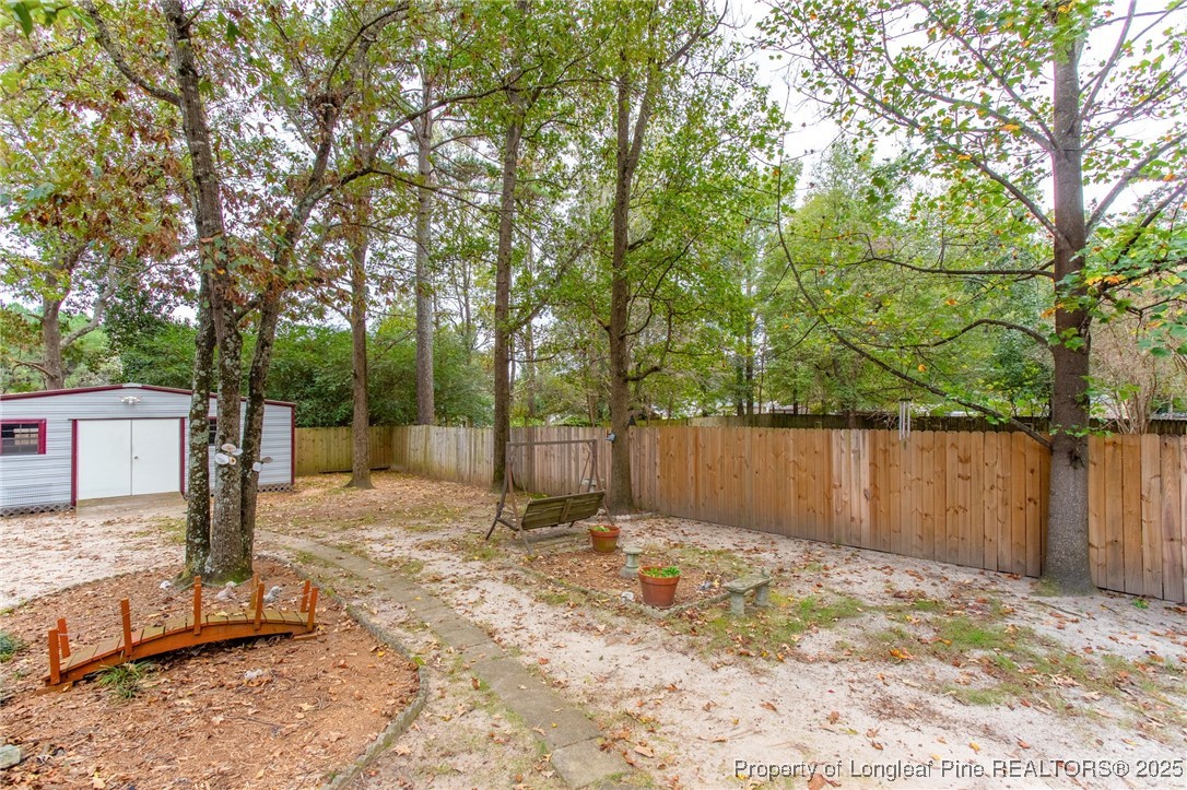 520 Inverary Drive Raeford, NC 28376 - Photo 33 of 43 a view of a backyard