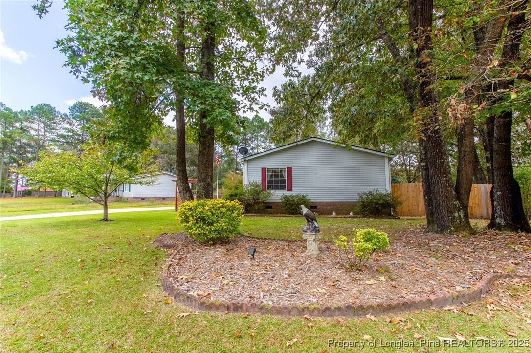 520 Inverary Drive Raeford, NC 28376 - Photo 34 of 43 a view of backyard of house with green space