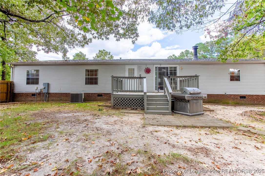 520 Inverary Drive Raeford, NC 28376 - Photo 37 of 43 a view of a house with a yard and large tree