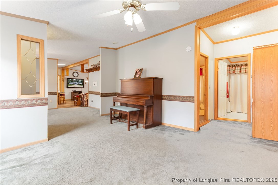 520 Inverary Drive Raeford, NC 28376 - Photo 6 of 43 a living room with furniture and a piano