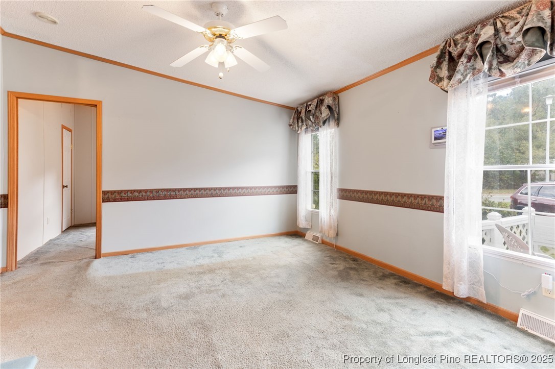 520 Inverary Drive Raeford, NC 28376 - Photo 7 of 43 a view of an empty room with a window